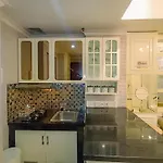 Modern 2Br Green Pramuka City Apartment Near Shopping Center By Travelio